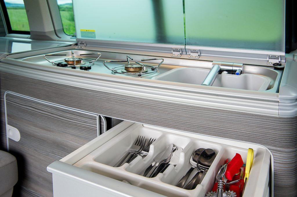 VW California Campervan kitchen with twin hob, sink and cutlery drawer