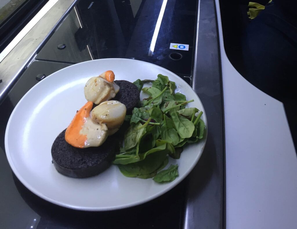 Wonderful Scallops with black pudding in a VW California Ocean on a rental with Four Seasons Campers