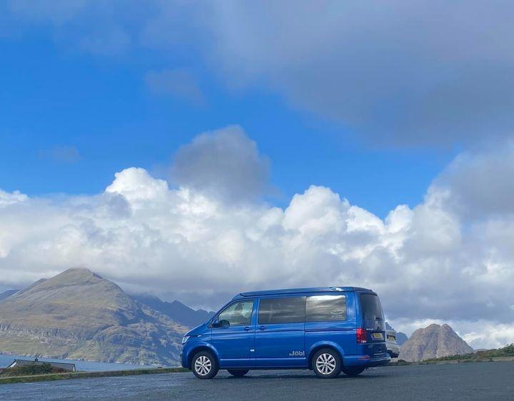 campervan on hire by mountains Scotland with Four Seasons Campers