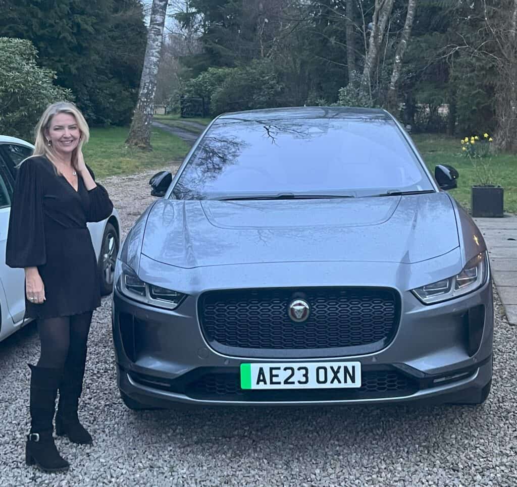 Liz owner of Four seasons campers with our electric jaguar E pace we use for eco-friendly Airport transfers for our campervan hire