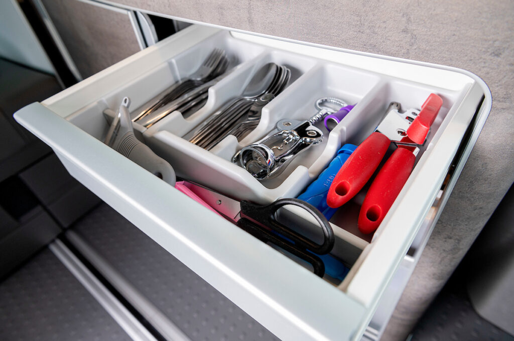 cutlery in cutlery drawer in campervan for hire with Four Seasons Campers Scotland