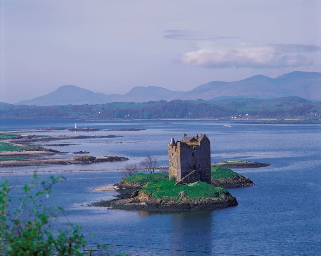 Castle stalker loch linnhe Scotland castle in scottish loch with hills in background