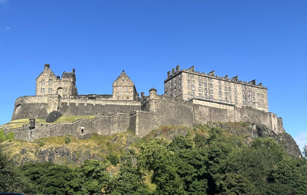 Edinburgh Castle with blue sky and trees